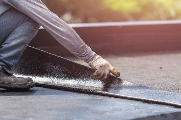 Professional Basement Waterproofing technician working in Baker, MT